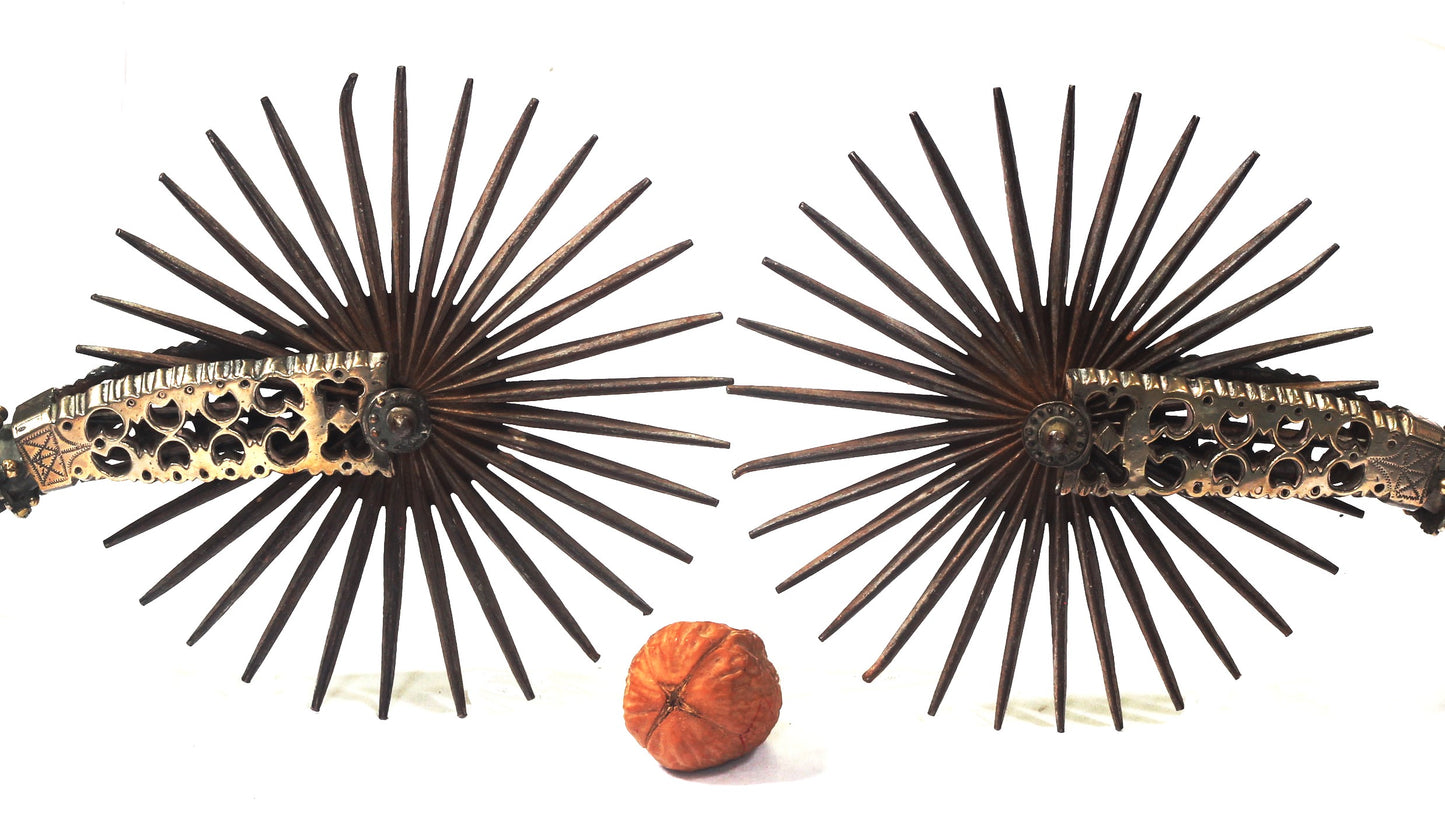 A Pair of Silver Decorated Chilean Huaso Spurs with Huge Rowels
