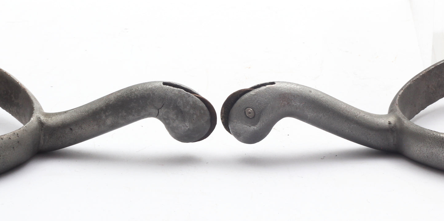 Pair of Nickel Swan Neck Spurs with Buttons, Buckles and Chains