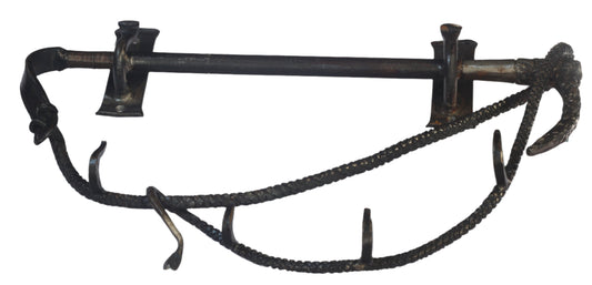 Handforged iron whip shaped rack
