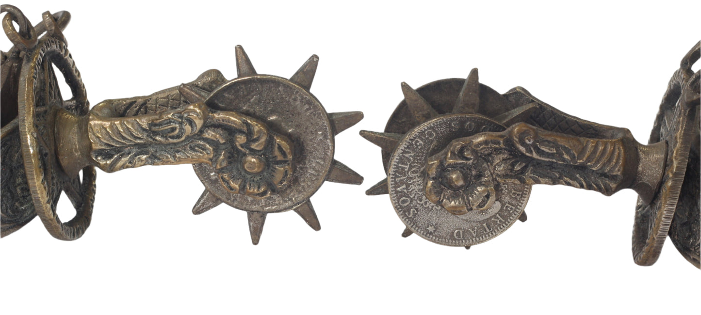 Pair of Argentine Gaucho Spurs with 1884 Coin Rowels
