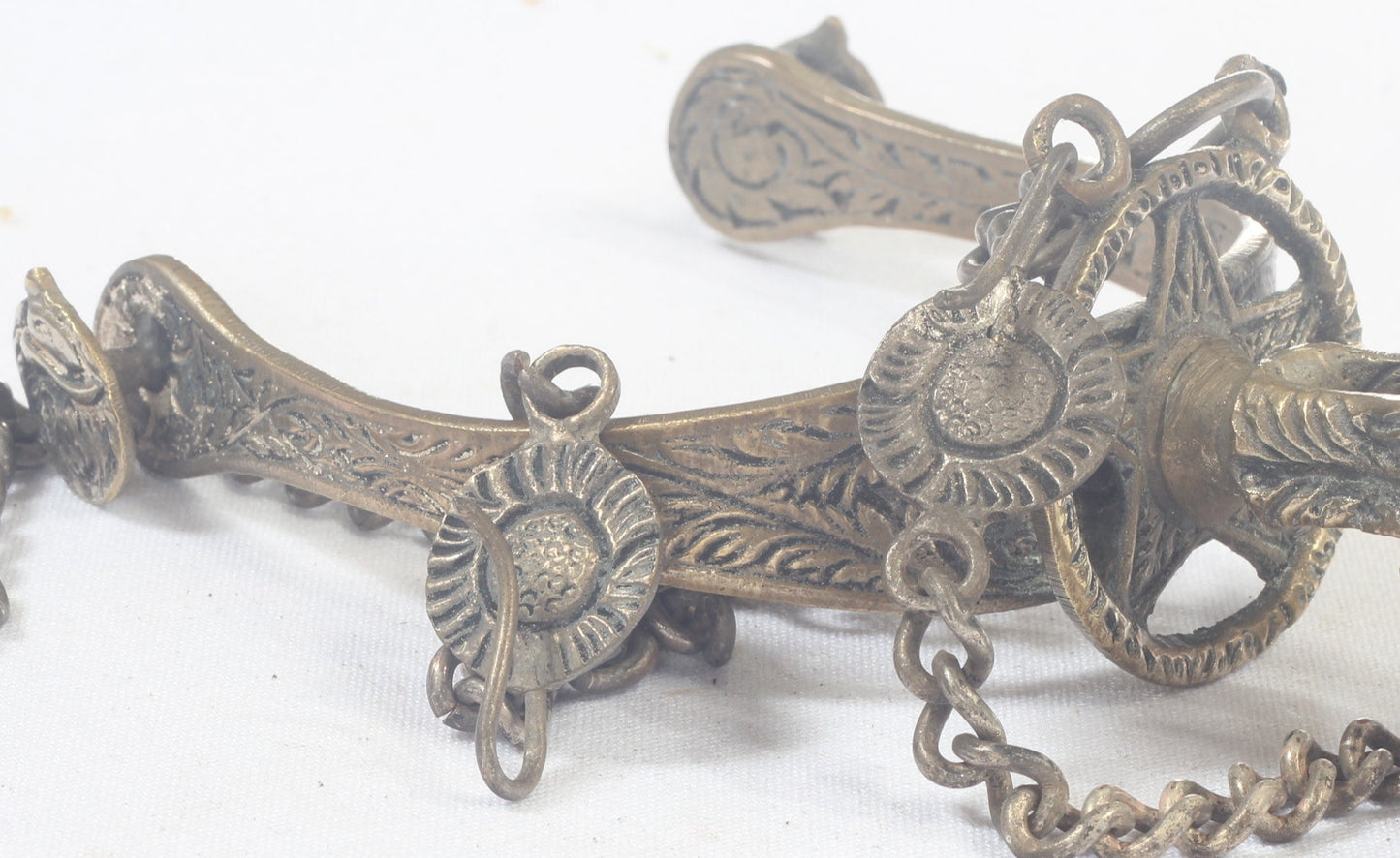 Pair of Argentine Gaucho Spurs with 1884 Coin Rowels