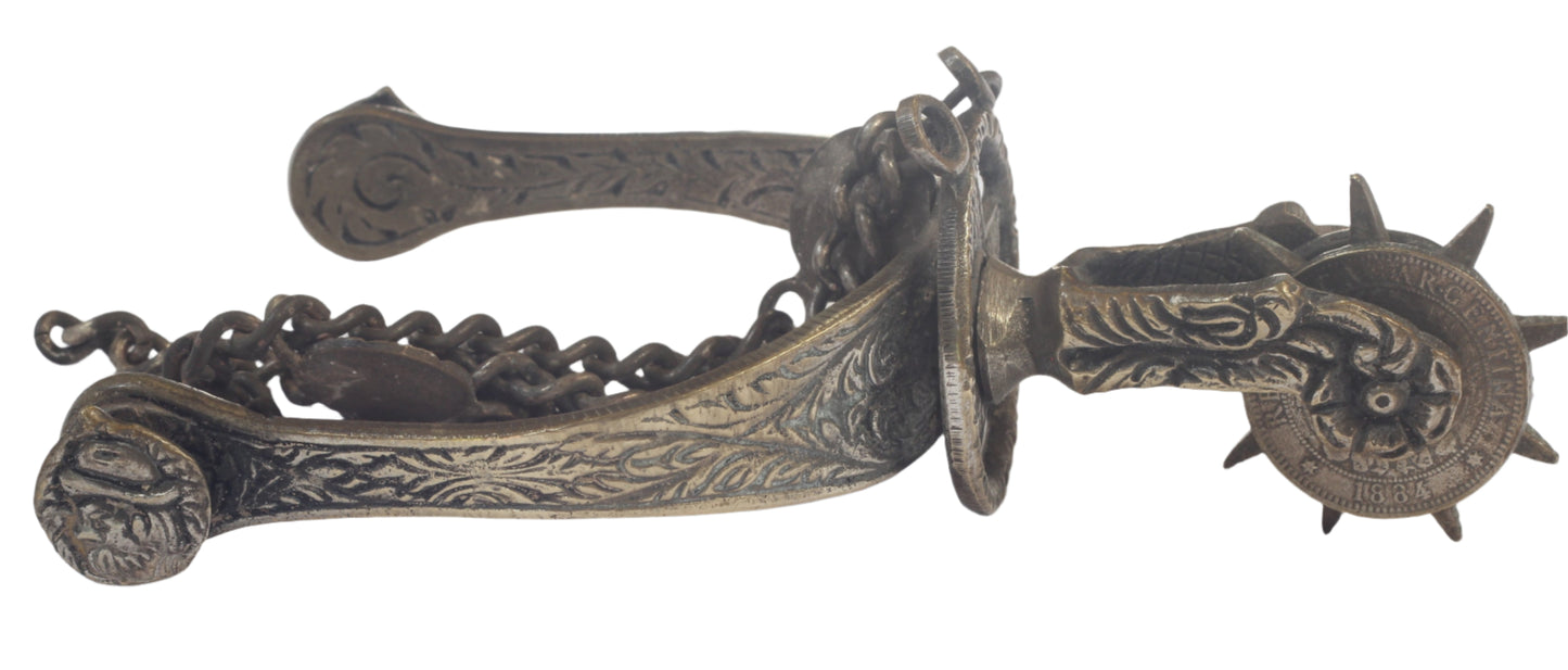 Pair of Argentine Gaucho Spurs with 1884 Coin Rowels
