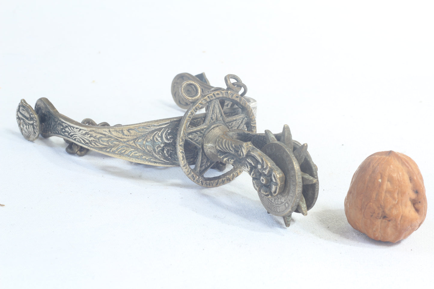 Pair of Argentine Gaucho Spurs with 1884 Coin Rowels