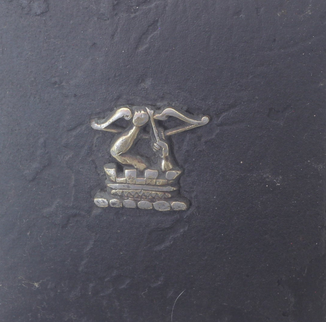 Antique crest on leather blinker