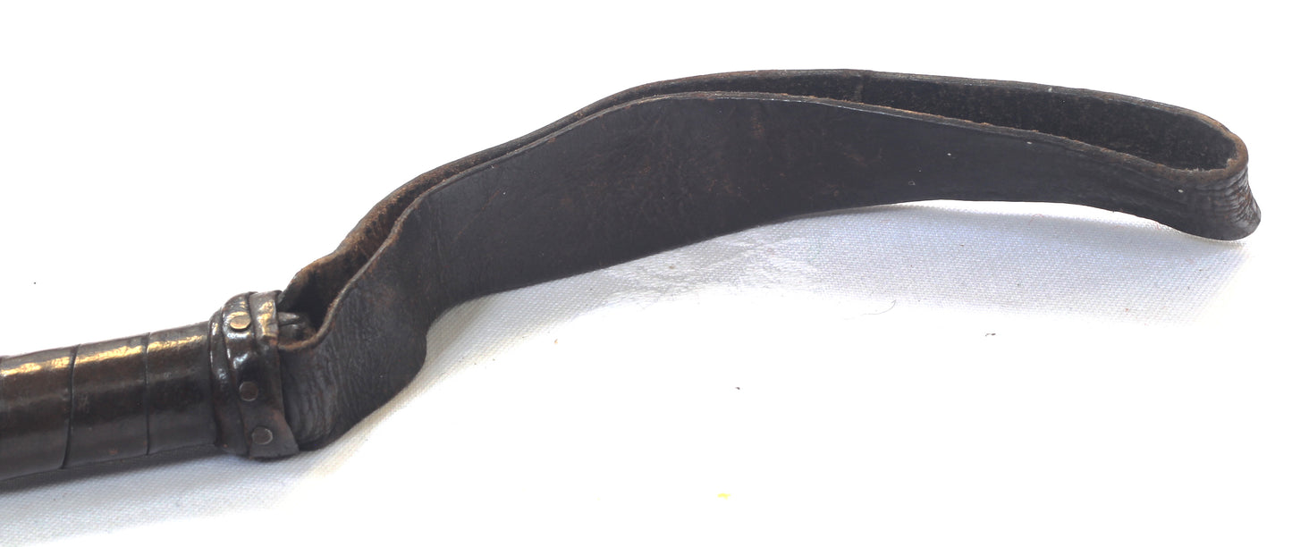 A Vintage Whip made of Leather Discs