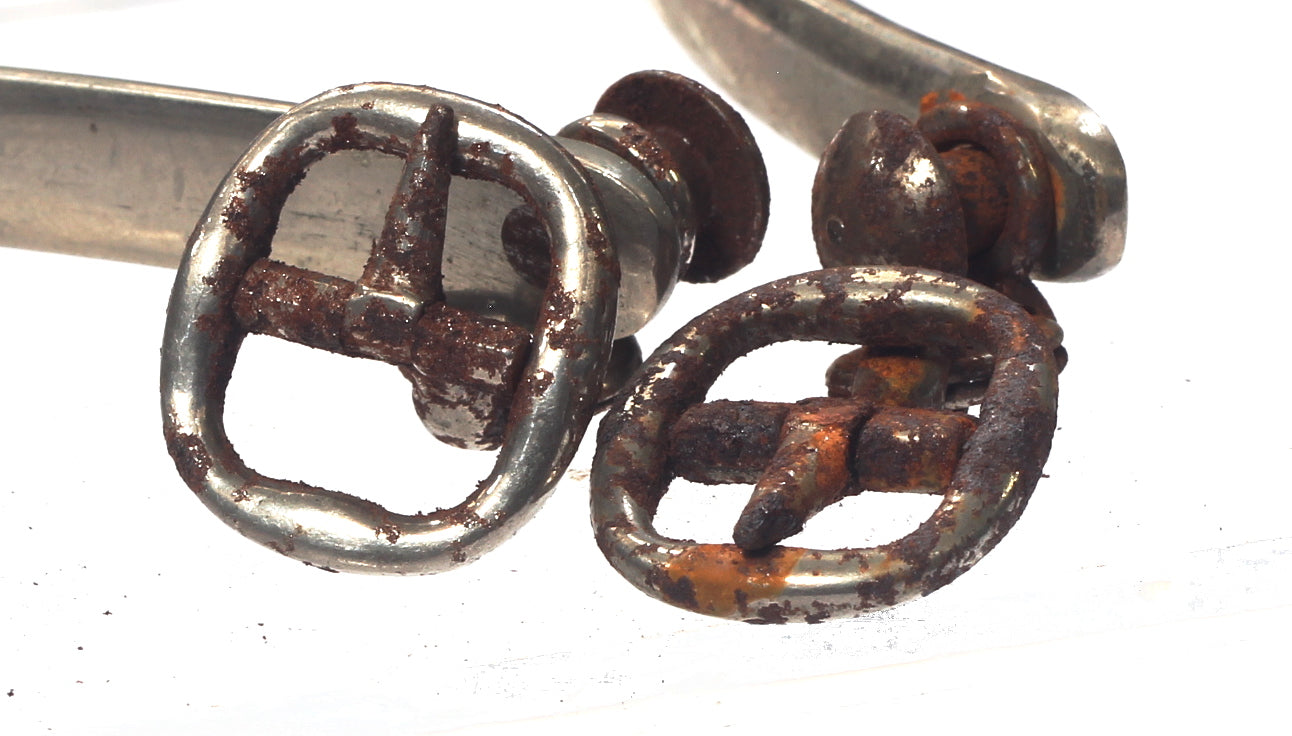 Pair of Maxwell Spurs with Buttons and Buckles