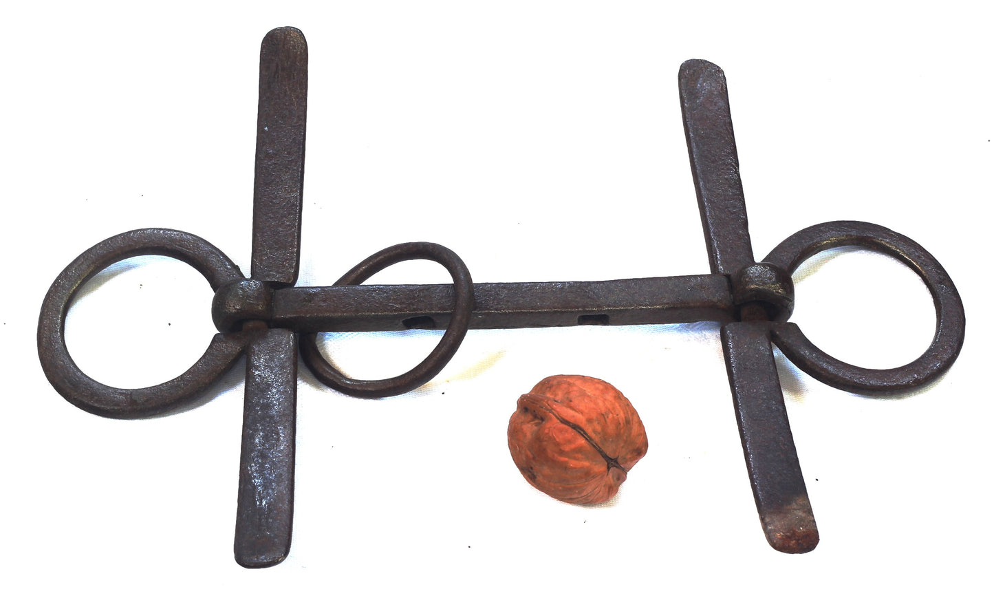 An Antique Hand Forged Steel Cheek Bit with Holes