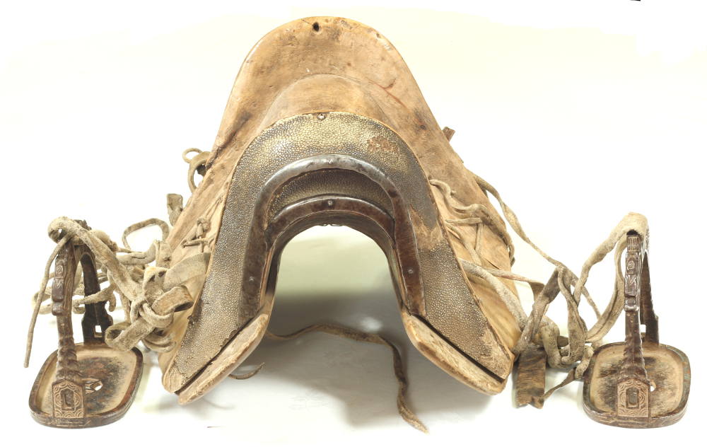 An 18th / 19th Century Chinese saddle and stirrups