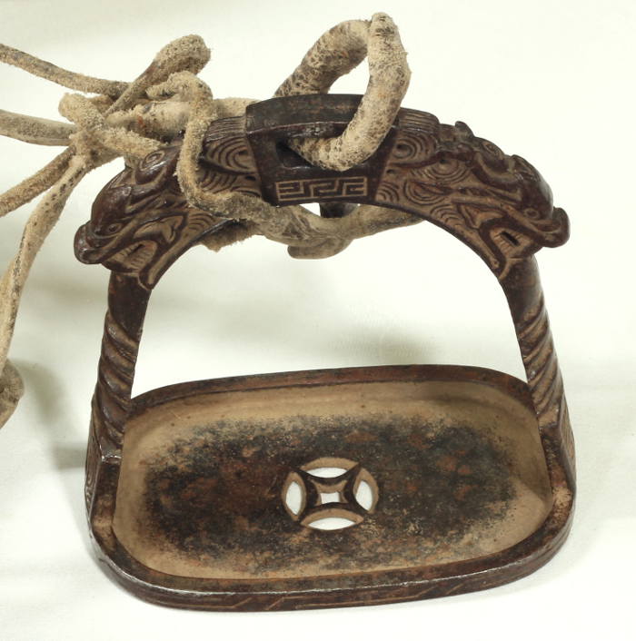 An 18th / 19th Century Chinese saddle and stirrups