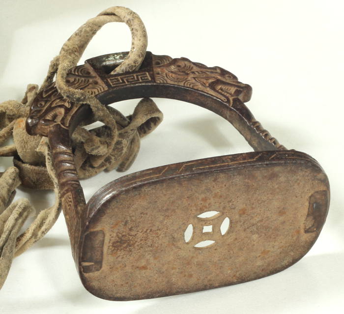 An 18th / 19th Century Chinese saddle and stirrups