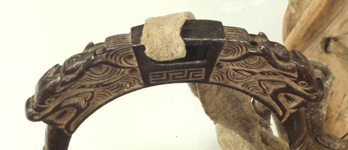 An 18th / 19th Century Chinese saddle and stirrups