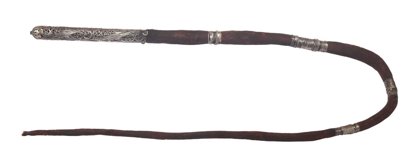 Antique hide whip with silver filigree