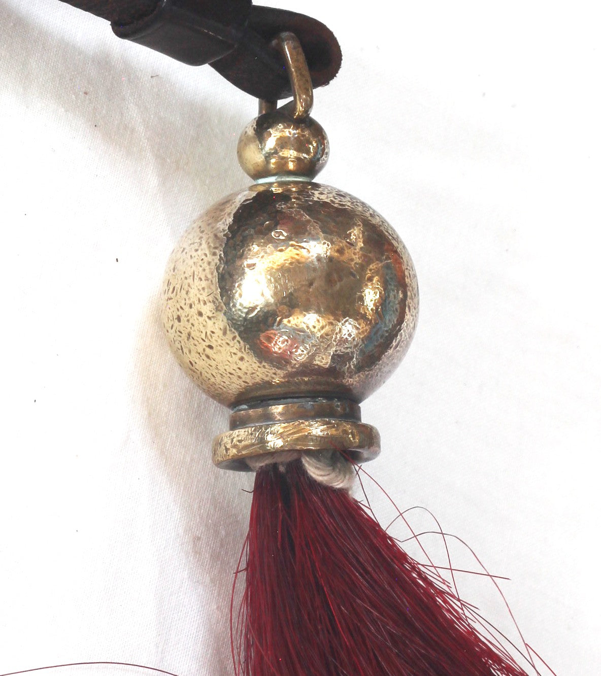 A Maroon & White Throat Plume or Beard for an Officer's Horse