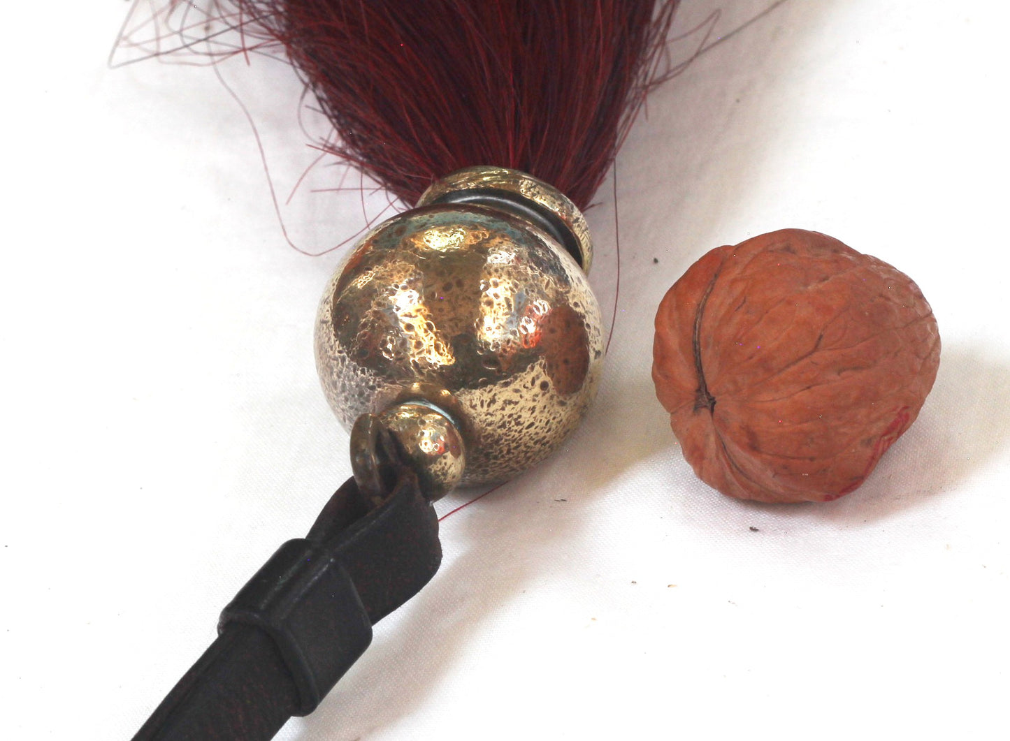 A Maroon & White Throat Plume or Beard for an Officer's Horse