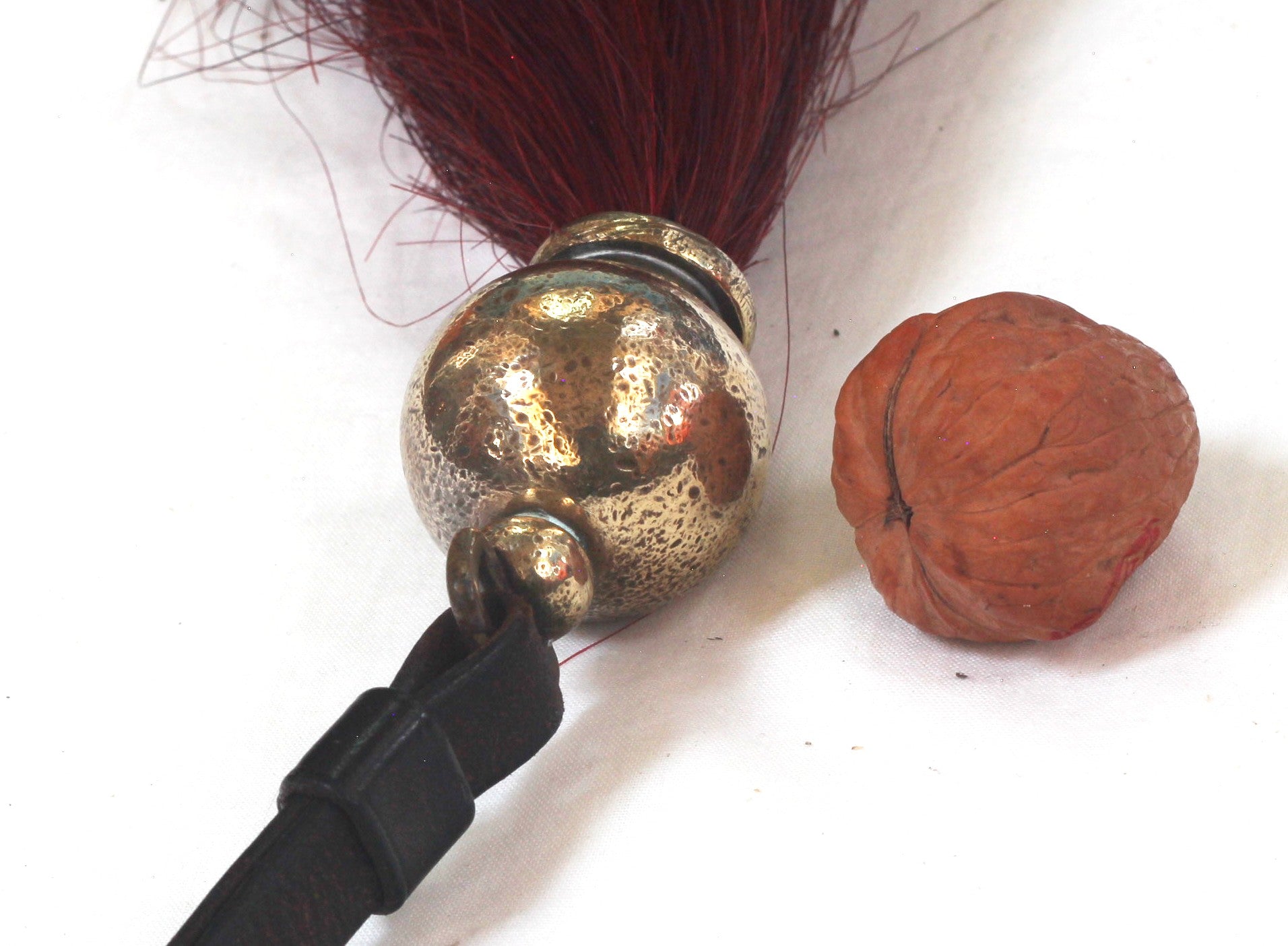 A Maroon & White Throat Plume or Beard for an Officer's Horse