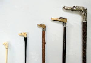 Antique whip handles shaped as dog heads