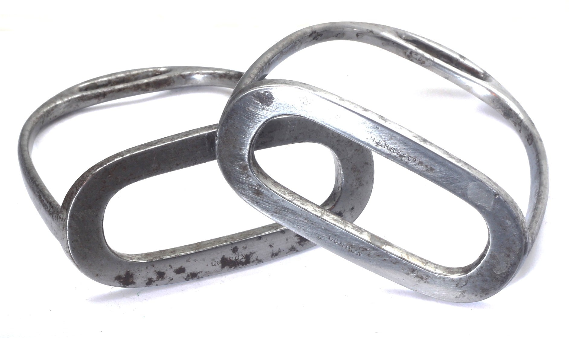 A Pair of Antique Steel Stirrups by Merry of St James