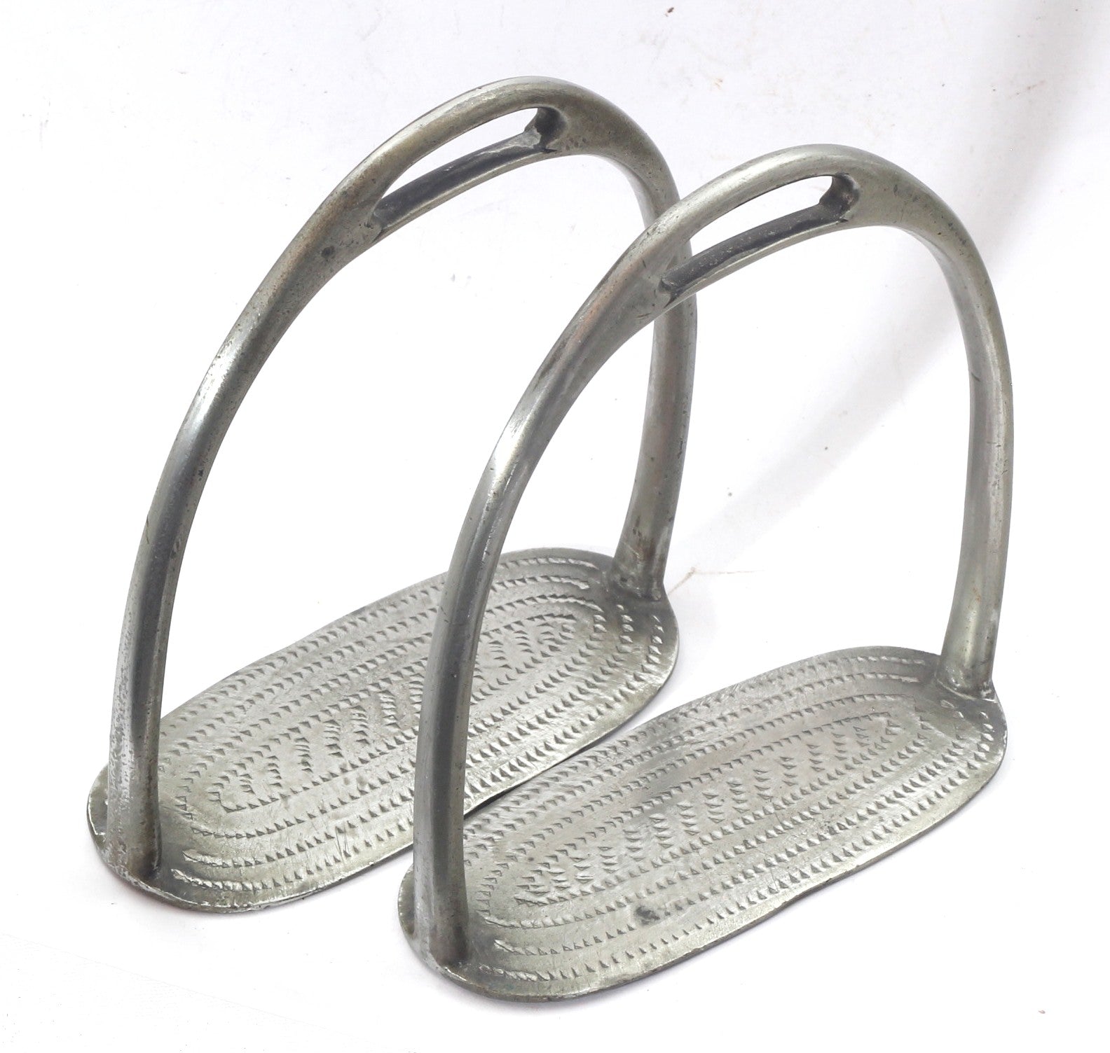 A Pair of Antique Nickel Silver Stirrups