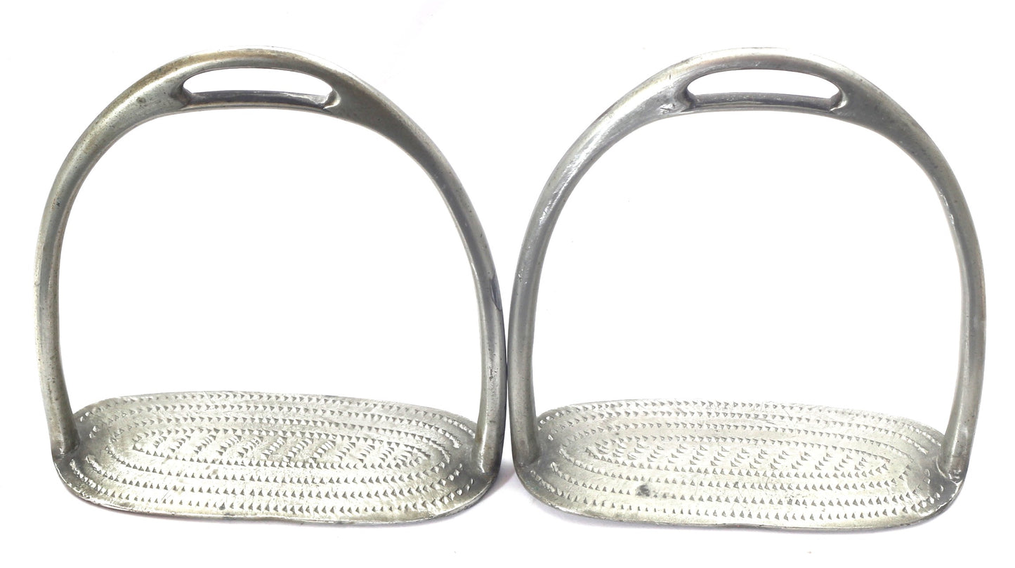 A Pair of Antique Nickel Silver Stirrups