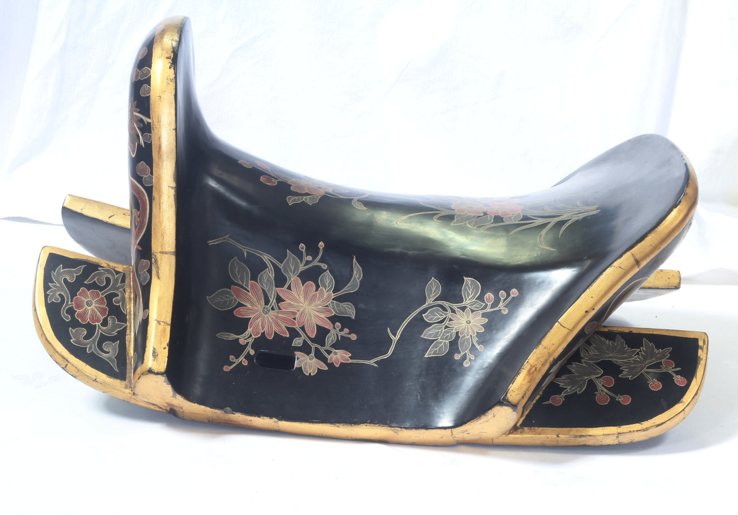 An early 20th Century Chinese lacquered saddle