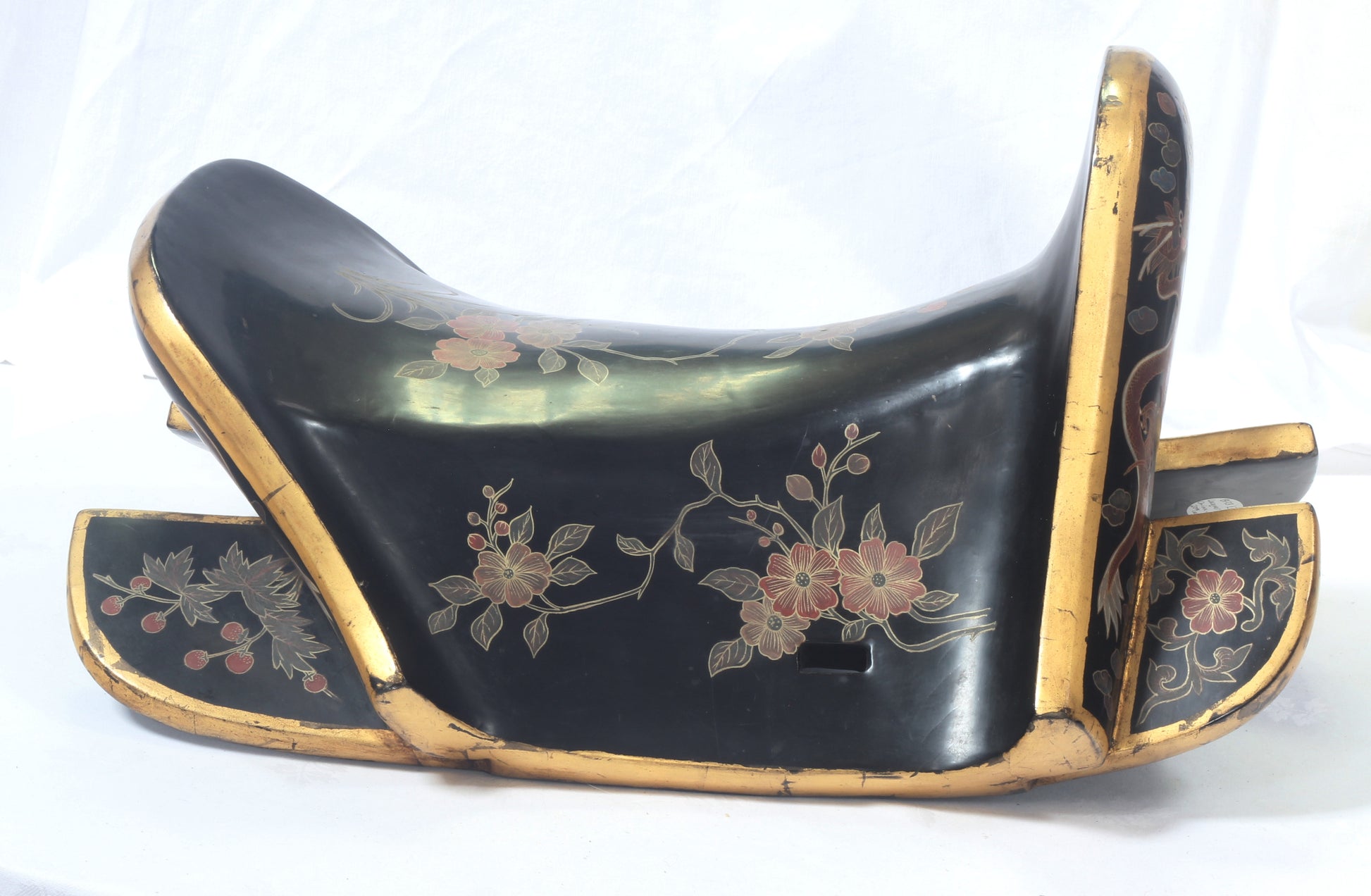 An early 20th Century Chinese lacquered saddle