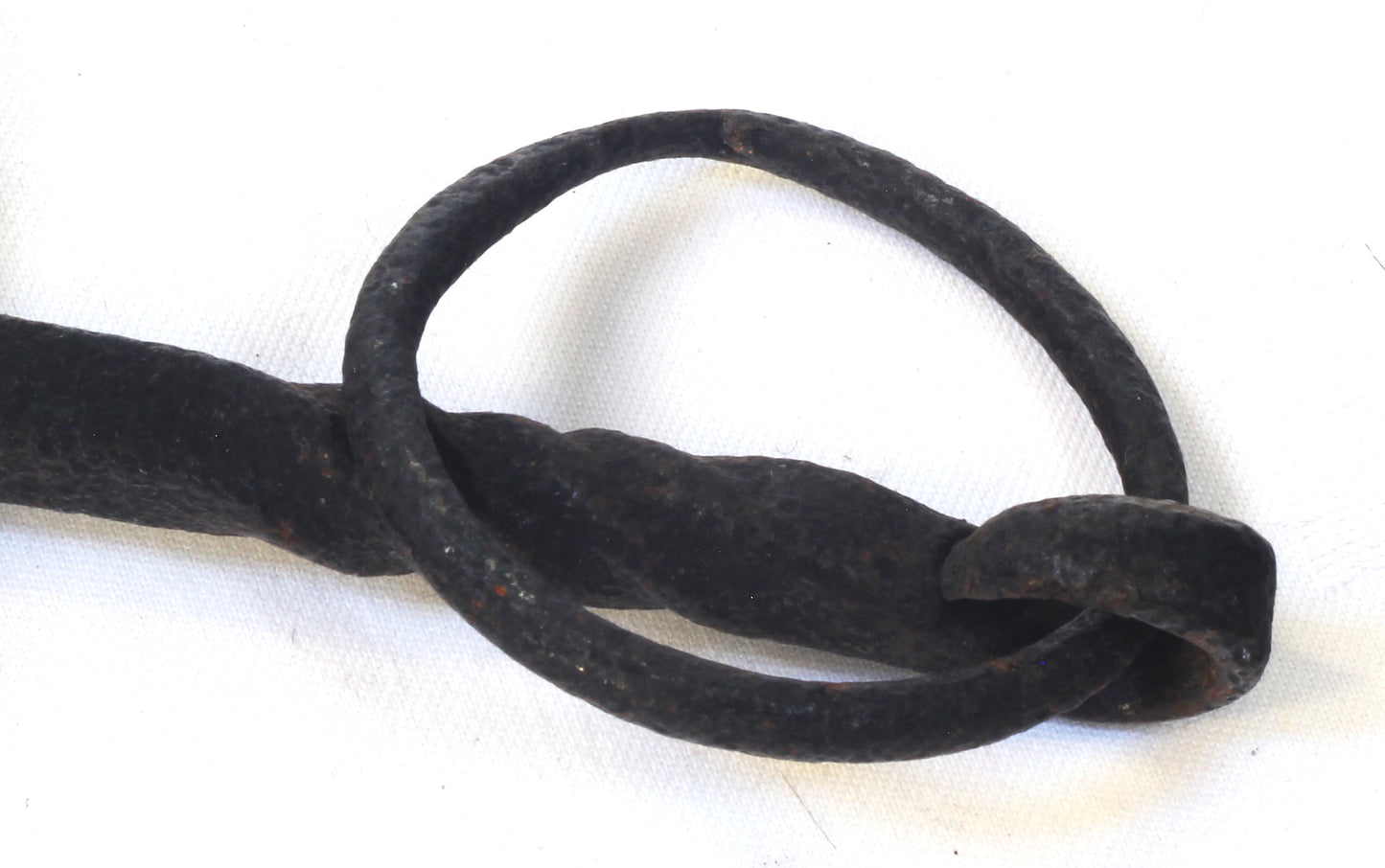 An Antique Hand Forged Iron Four Ring Twisted Dray Bit