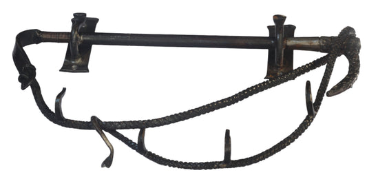Handforged iron whip shaped rack