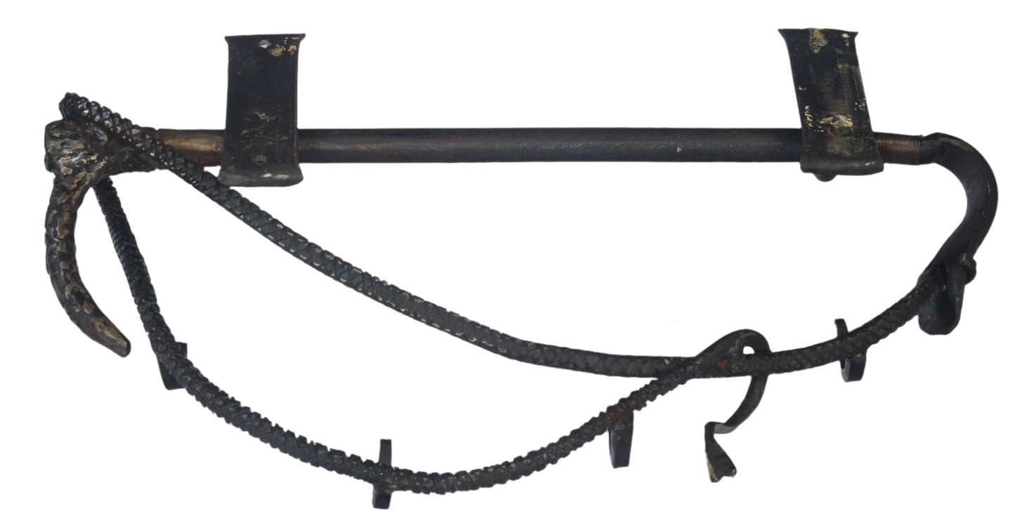 Handforged iron whip shaped rack