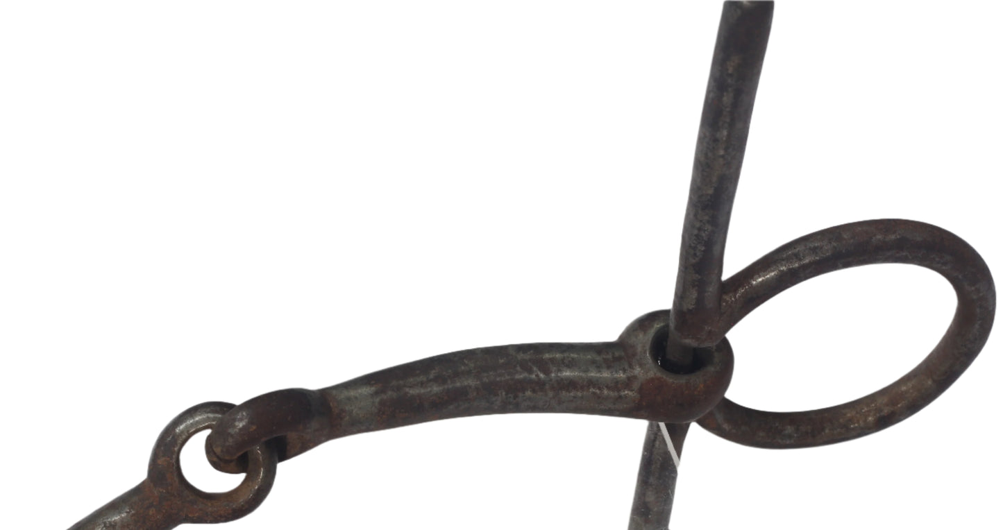 An Antique Steel Full Cheek Snaffle Bit