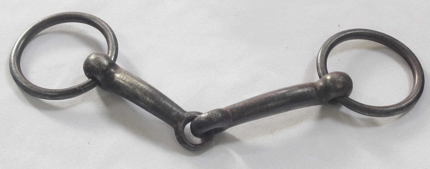 An Antique Steel Loose Ring Snaffle Bit