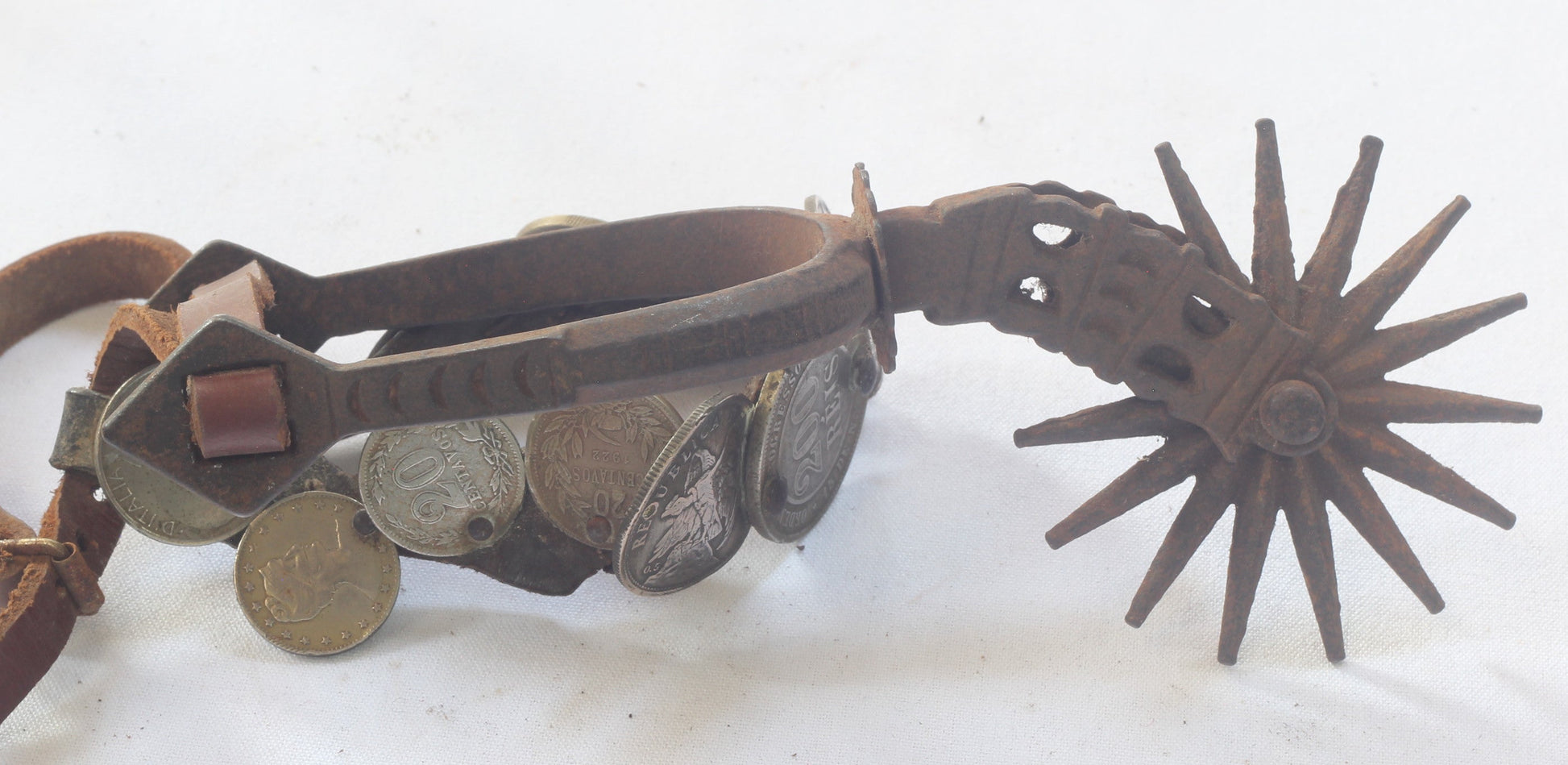 Pair of South American Spurs with Coin Decorated Straps