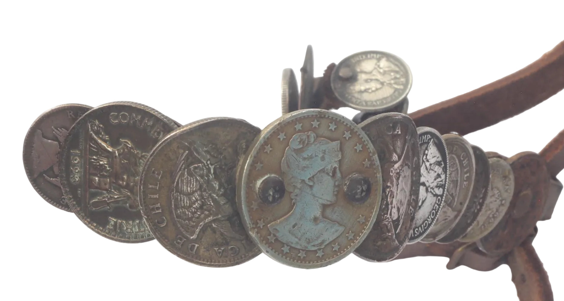 Pair of South American Spurs with Coin Decorated Straps