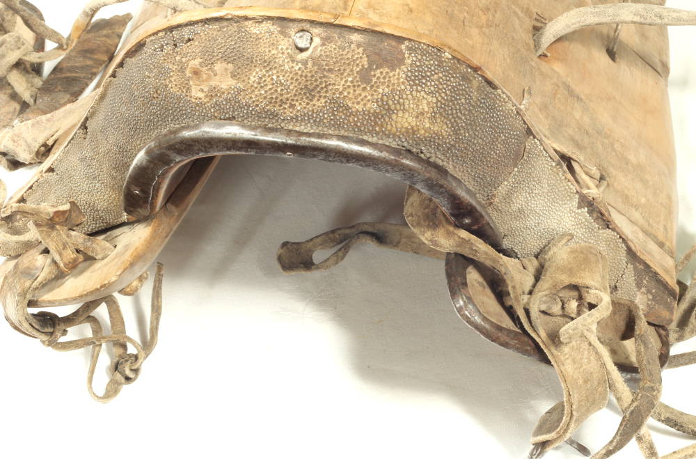 An 18th / 19th Century Chinese saddle and stirrups